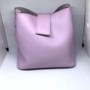 From Shein:Minimalist medium bucket bag color: lilac